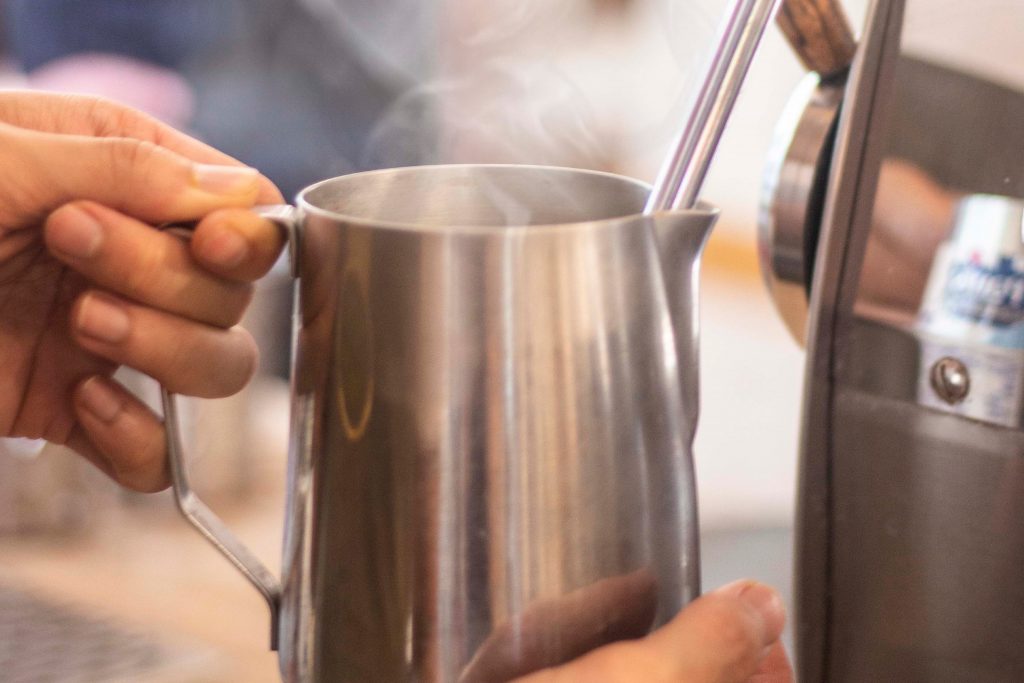 Our Barista perfectly steaming milk